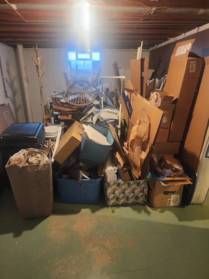 Roll-off dumpster container at job site for 6 Yard Dumpster Rental in Conway